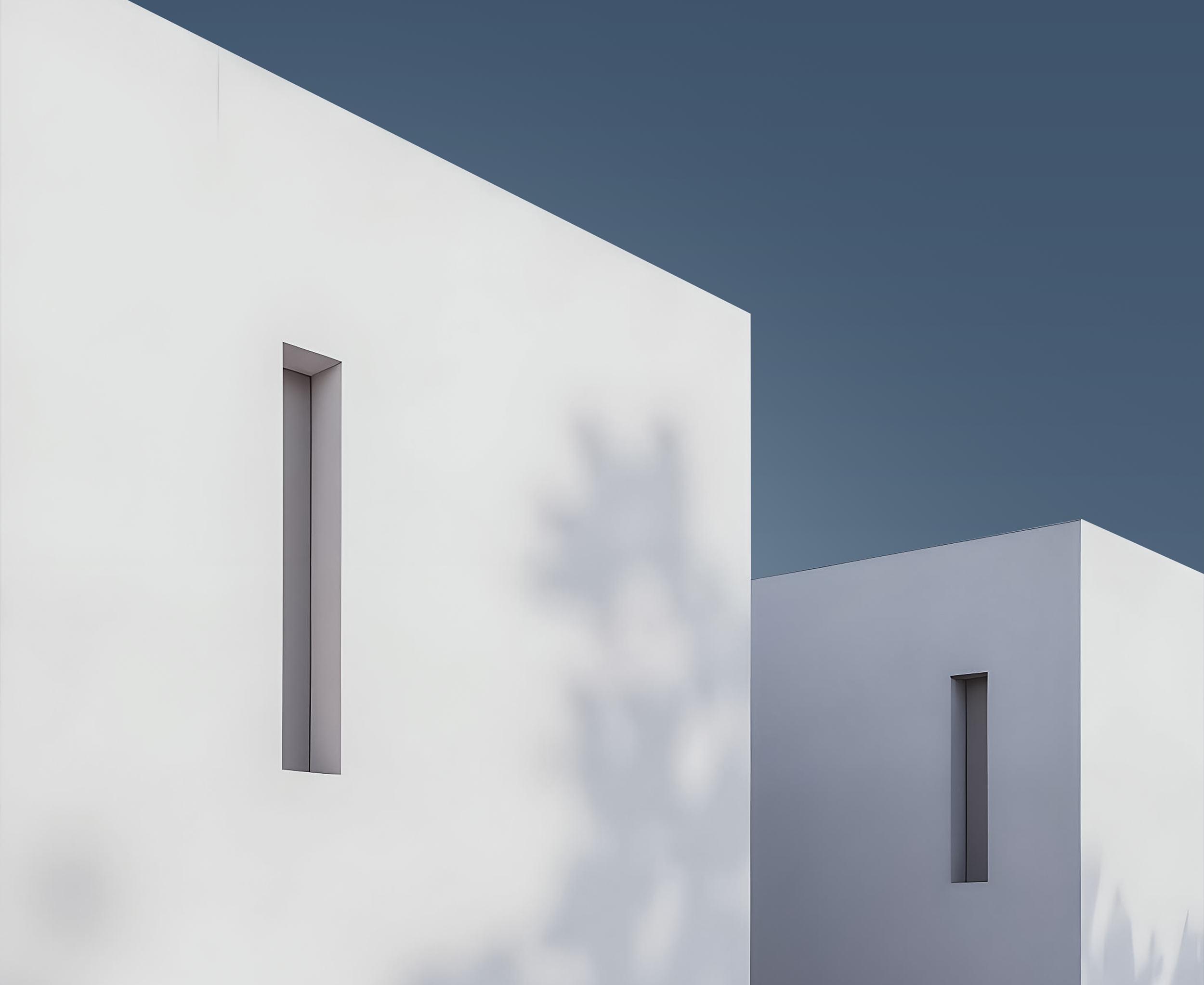 aesthetic 2 white building with blue sky background